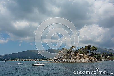 Laganas, Greece - 06/11/2016: Seascape. Motor boats near the island Editorial Stock Photo