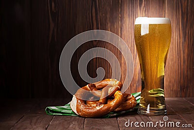 Lager beer glass and pretzel Stock Photo