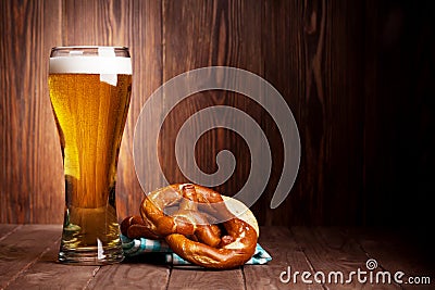 Lager beer glass and pretzel Stock Photo