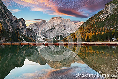Lago di Braies lake and Seekofel peak at sunrise, Dolomites. Italy Stock Photo