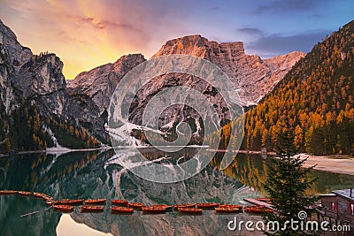 Lago di Braies lake and Seekofel peak at sunrise, Dolomites. Italy Stock Photo