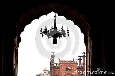 Silhouette view of ceiling fanos lamp inside the badshahi mosque, the emperor mosque, mughals Stock Photo