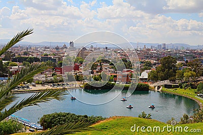 Lake and Aerial view of the modern city of Puebla, mexico VII Editorial Stock Photo