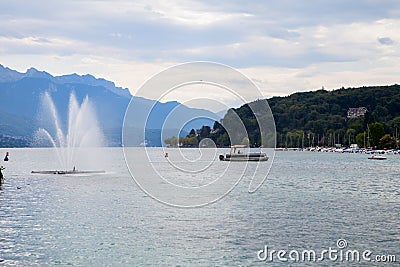 Lake Annecy, boating, sailing and paraglider Stock Photo