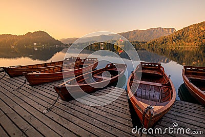 Lake Bled with boats at autumn background. Lake bled is famous place and popular European travel destination Editorial Stock Photo