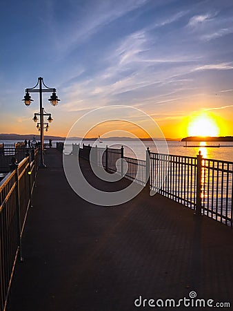 Lake Champlain pier at sunset Stock Photo