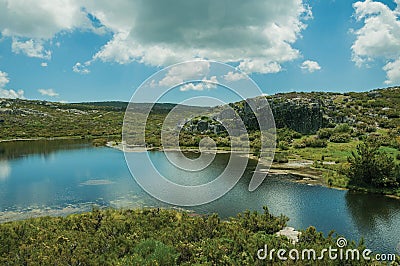 Lake from dam in a rocky terrain on highlands Stock Photo