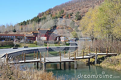 The lake Er Loon Yan in front of the monastery Choon Lin Sy Zhongling in Wudalianchii in sunny weather, China Editorial Stock Photo