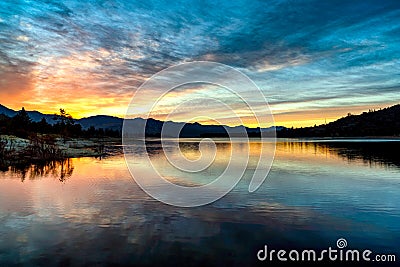 LAKE HEMET, SUNRISE CLOUD REFLECTIONS Stock Photo
