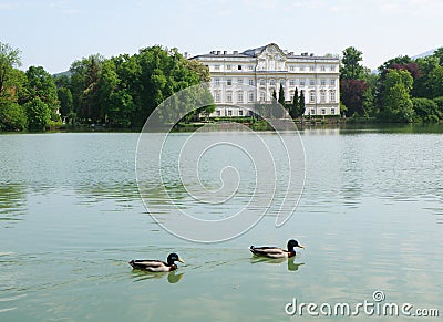 Lake Leopoldskroner Weiher with the Schloss Leopoldskron Stock Photo