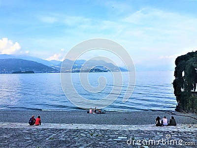 Lake Maggiore, Piedmont region, Italy. People, shore and peace Editorial Stock Photo