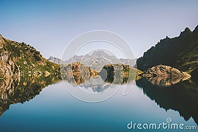 Lake in mountains mirror water reflection landscape morning view travel wilderness nature Stock Photo