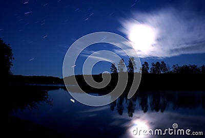 Lake Seliger night: stars clouds moon Stock Photo