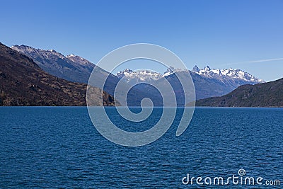 Lake Puelo with distant snow-caped mountains Stock Photo