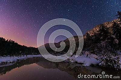 Lake Riedenersee at night with stars Stock Photo