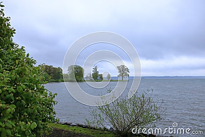 The Lake Schwerin (German: Schweriner See) at the castle and the city on a cloudy day Stock Photo