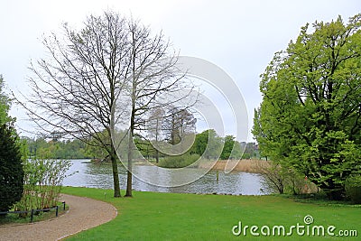 The Lake Schwerin (German: Schweriner See) at the castle and the city on a cloudy day Stock Photo