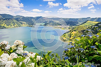 Lake of Sete Cidades with hortensia's, Azores Stock Photo