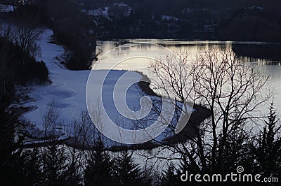 Lake and Snow at Dusk Stock Photo