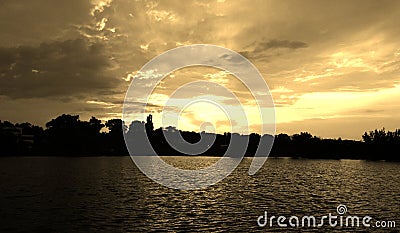 Lake sunset, blue sky burning Stock Photo