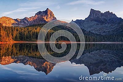 Lake Svetloye in Ergaki among the taiga rocks autumn Stock Photo