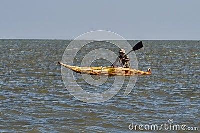 Lake Tana, Ethiopia - Feb 05, 2020: Rower in a canoe at Zege Peninsula in Lake Tana Editorial Stock Photo