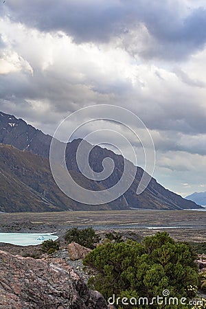 Lake Tasman and the sheer cliffs of the South Island. New Zealand Stock Photo