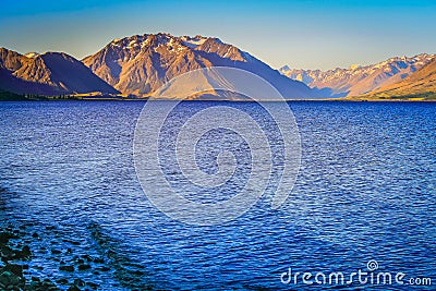 Lake Tekapo at peaceful evening, New Zealand South island idyllic landscape Stock Photo