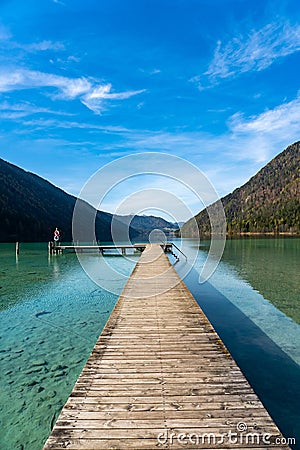 Lake Weissensee in Carinthia. Jetty at the east riverbank close to Stockenboi Stock Photo