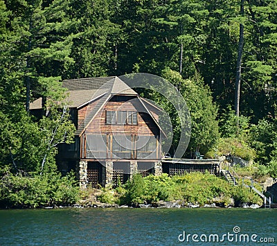 Lakefront log home Stock Photo