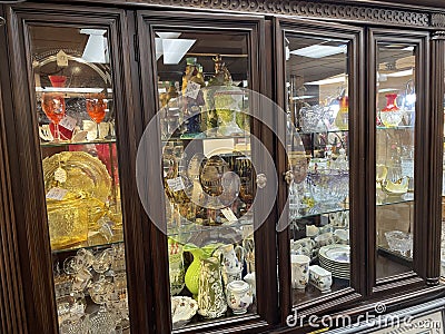 Antique vintage shop holiday display glass case cabinet Editorial Stock Photo