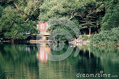 Lakeside house hidden among trees in Karagol izmir turkey Stock Photo