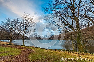 Lakeside view in Winter over Buttermere Stock Photo