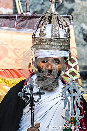 Lalibela, Ethiopia - Feb 14, 2020: Ethiopian priest at the famous Monastery Neakuto Leab near Lalibela in Ethiopia Editorial Stock Photo