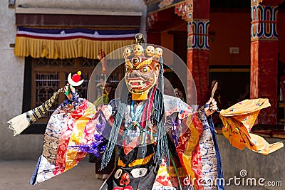 Lamayuru. Monk in mask performs buddhist sacred cham dance Stock Photo