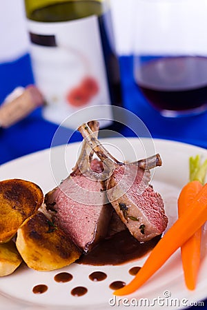 Lamb chop meal with wine Stock Photo