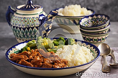 Lamb gulash with rice and vegetables. Stock Photo