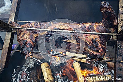 Lamb roasted on a spit, a city holiday Stock Photo