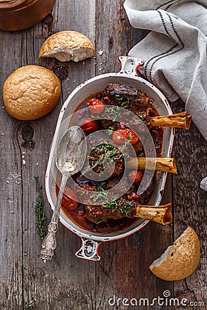 Lamb shank braised in tomato sauce, top view Stock Photo