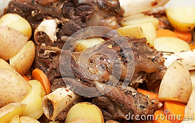 Lamb shanks cooked with potatoes Stock Photo