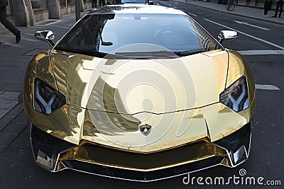 Lamborghini, gold colored sport car in the street Editorial Stock Photo