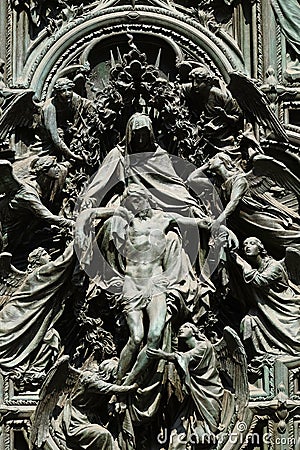Lamentation of Christ, detail of the main bronze door of the Milan Cathedral Stock Photo