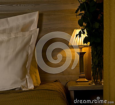 Lamp on bedroom nightstand Stock Photo