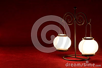 Lamp on carmine background Stock Photo