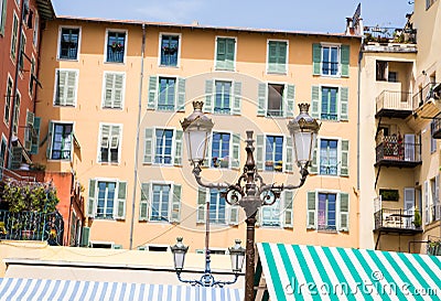 Lamp and Green Striped Awning Stock Photo