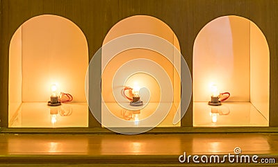 Lamp lighting orange curve decoration on wall Stock Photo