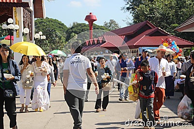 2023-05-01:Lampang Thailand:A lot of people take a walk and make merit at the temple Editorial Stock Photo