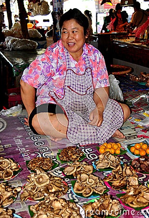 Lamphun, Thailand: Woman Selling Mushrooms Editorial Stock Photo