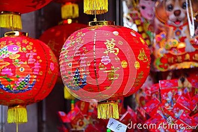 Lamps and red garments for use during Chinese New Year. Stock Photo