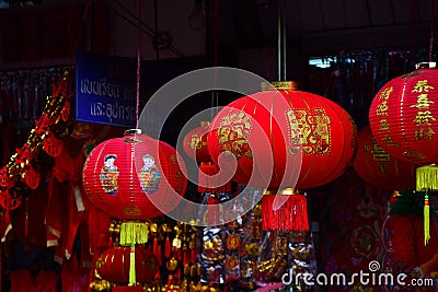 Lamps and red garments for use during Chinese New Year. Editorial Stock Photo